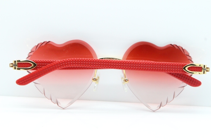 Cartier Rimless 3524012 Heart Red Aztec sunglasses in Gold Red Lens