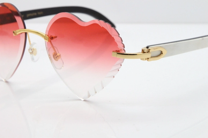 Cartier Rimless 3524012 Heart White Inside Black Buffalo Horn Sunglasses in Gold Red Lens