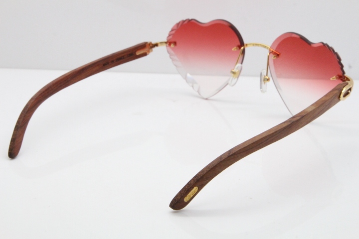 Cartier Rimless 3524012 Heart Original Pear Wood Sunglasses In Gold Red Lens