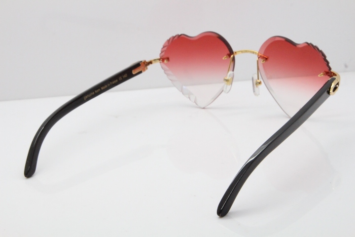 Cartier Rimless 3524012 Heart Black Buffalo Horn Sunglasses in Gold Red Lens