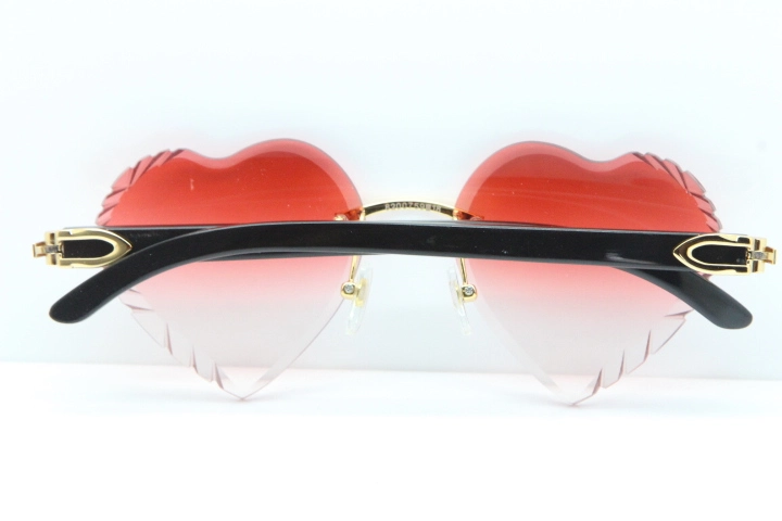 Cartier Rimless 3524012 Heart Black Buffalo Horn Sunglasses in Gold Red Lens