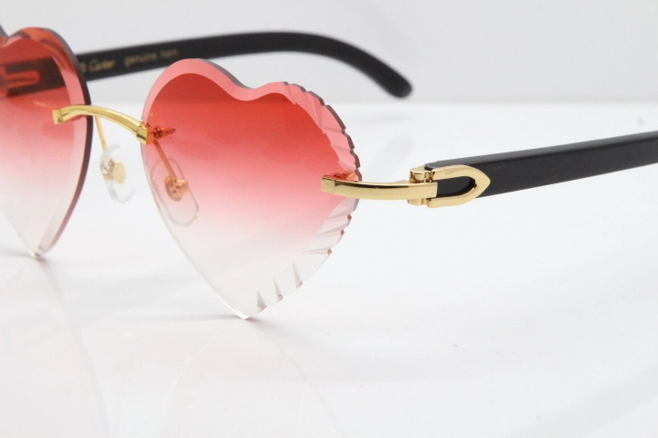 Cartier Rimless 3524012 Heart Black Buffalo Horn Sunglasses in Gold Red Lens