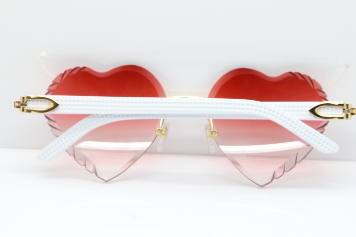 Cartier Rimless 3524012 Heart White Aztec sunglasses in Gold Red Lens