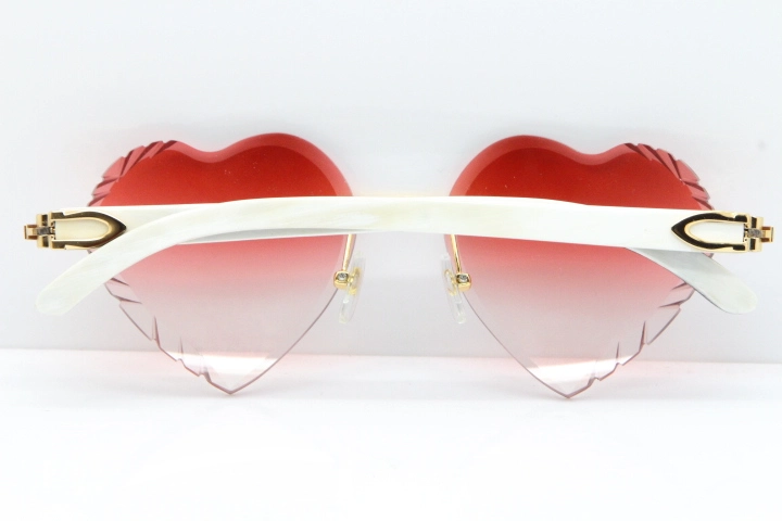 Cartier Rimless 3524012 Heart White Inside Black Buffalo Horn Sunglasses in Gold Red Lens