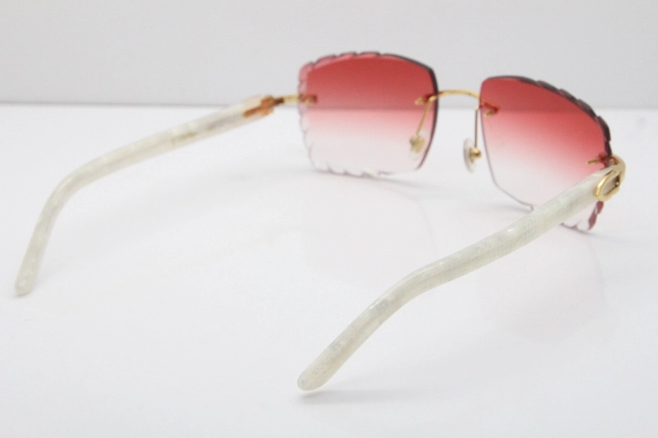 Cartier Rimless 8300816 Marble White Aztec Sunglasses In Gold Red Lens