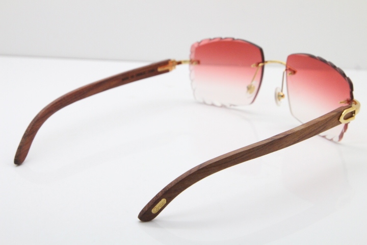Cartier Rimless 8300816 Pear Wood Sunglasses In Gold Red Lens