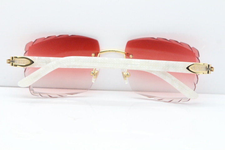 Cartier Rimless 8300816 Marble White Aztec Sunglasses In Gold Red Lens