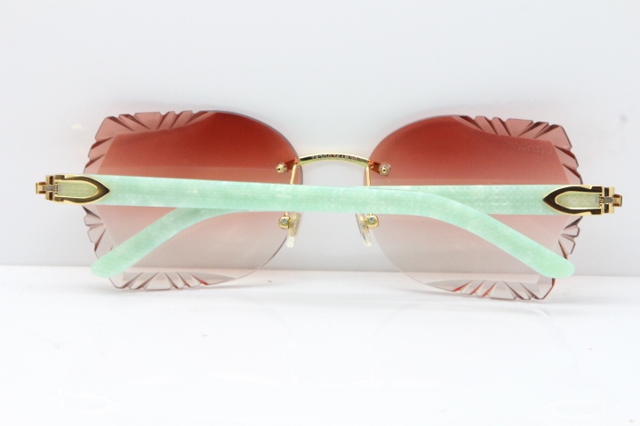 Cartier Rimless T8200762 Marble Green Aztec Arms Sunglasses In Gold Pink Lens