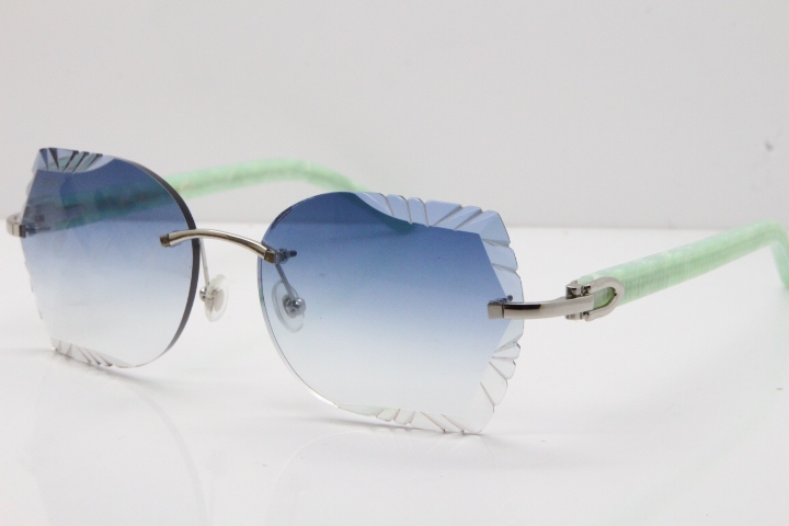 Cartier Rimless T8200762 Marble Green Aztec Arms Sunglasses In Gold Blue Lens