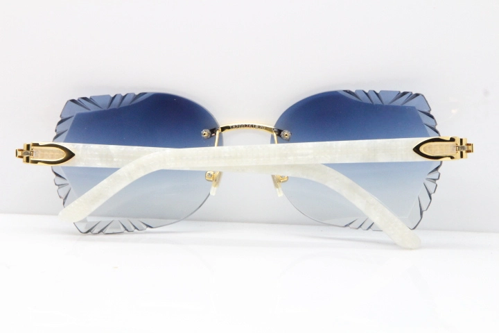 Cartier Rimless T8200762 White Aztec Arms Sunglasses In Gold Blue Lens