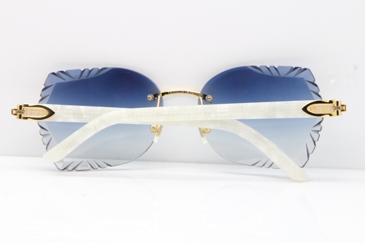 Cartier Rimless T8200762 White Aztec Arms Sunglasses In Gold Blue Lens