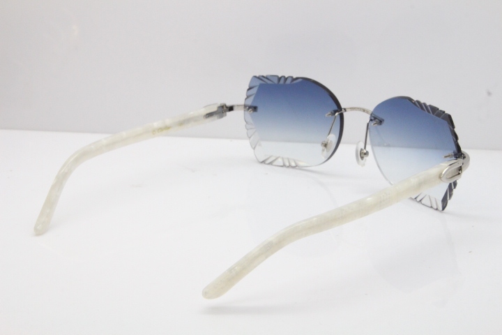 Cartier Rimless T8200762 Marble White Aztec Arms Sunglasses In Gold Blue Lens