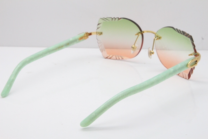 Cartier Rimless T8200762 Marble Green Aztec Arms Sunglasses In Gold Green Brown Lens