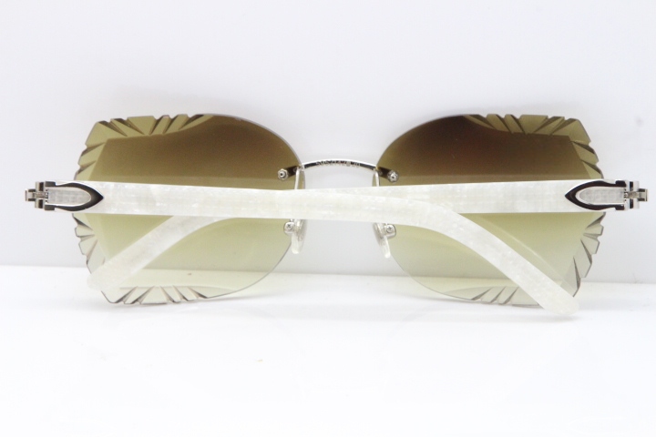 Cartier Rimless T8200762 Marble White Aztec Arms Sunglasses In Gold Brown Lens 