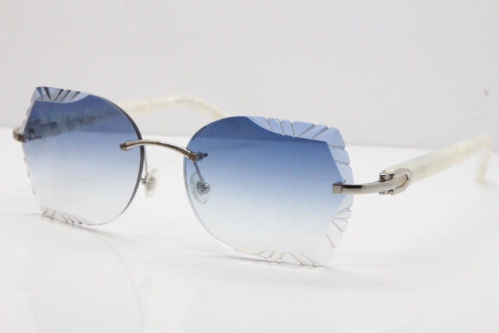 Cartier Rimless T8200762 Marble White Aztec Arms Sunglasses In Gold Blue Lens