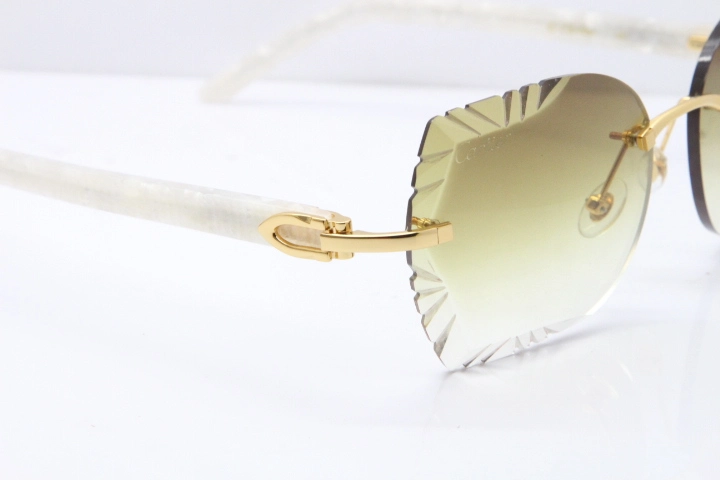 Cartier Rimless T8200762 Marble White Aztec Arms Sunglasses In Gold Brown Lens 