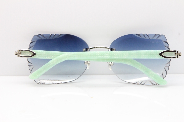 Cartier Rimless T8200762 Marble Green Aztec Arms Sunglasses In Gold Blue Lens