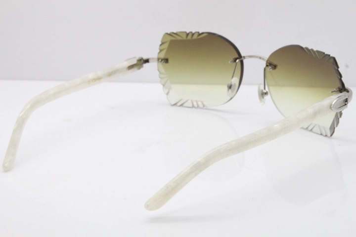 Cartier Rimless T8200762 Marble White Aztec Arms Sunglasses In Gold Brown Lens 