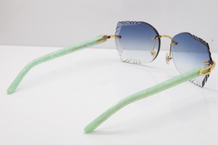 Cartier Rimless T8200762 Marble Green Aztec Arms Sunglasses In Gold Blue Lens