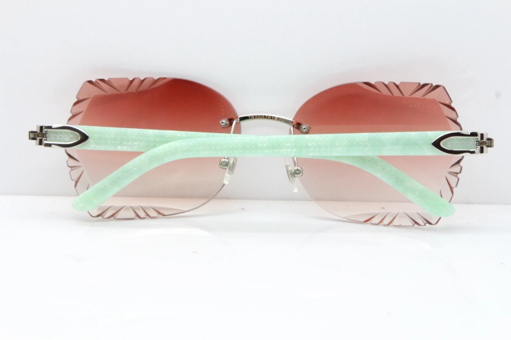 Cartier Rimless T8200762 Marble Green Aztec Arms Sunglasses In Gold Pink Lens