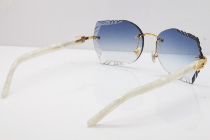 Cartier Rimless T8200762 Marble White Aztec Arms Sunglasses In Gold Blue Lens