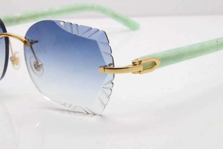 Cartier Rimless T8200762 Marble Green Aztec Arms Sunglasses In Gold Blue Lens