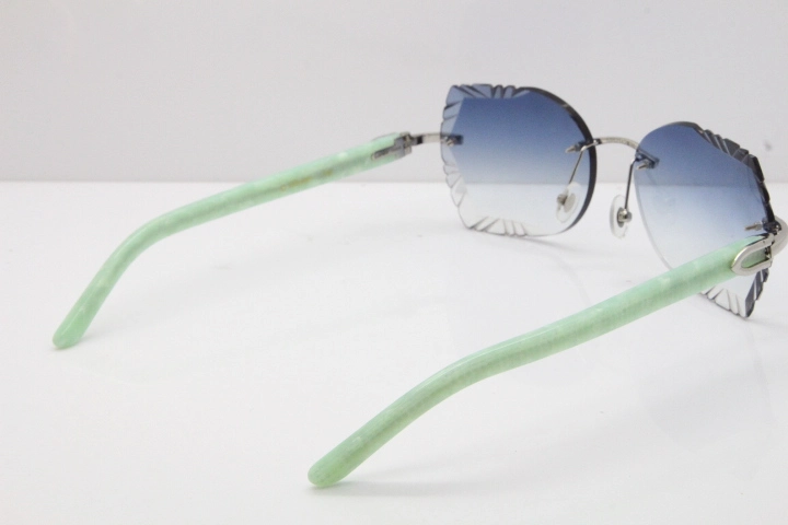 Cartier Rimless T8200762 Marble Green Aztec Arms Sunglasses In Gold Blue Lens