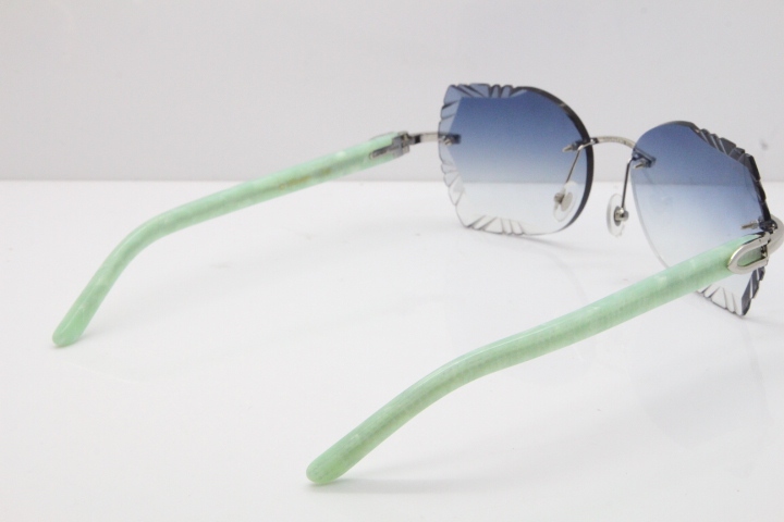 Cartier Rimless T8200762 Marble Green Aztec Arms Sunglasses In Gold Blue Lens