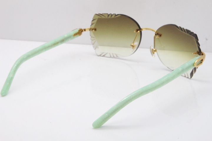 Cartier Rimless T8200762 Marble Green Aztec Arms Sunglasses In Gold Brown Lens