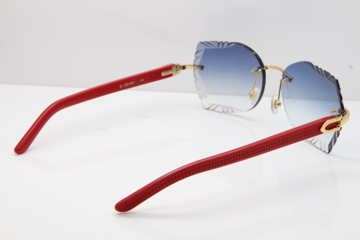 Cartier Rimless T8200762 Red Aztec Arms Sunglasses In Gold Blue Lens