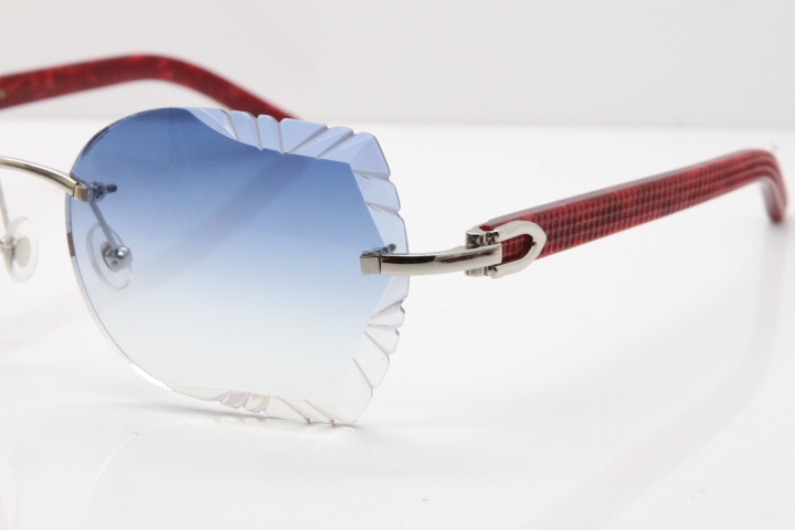 Cartier Rimless T8200762 Marble Red Aztec Arms Sunglasses In Gold Blue Lens