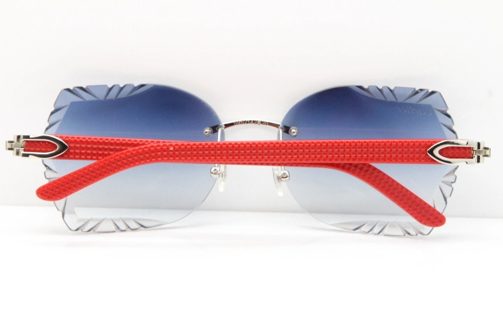 Cartier Rimless T8200762 Red Aztec Arms Sunglasses In Gold Blue Lens