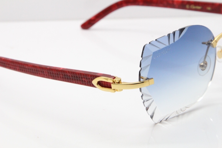 Cartier Rimless T8200762 Marble Red Aztec Arms Sunglasses In Gold Blue Lens