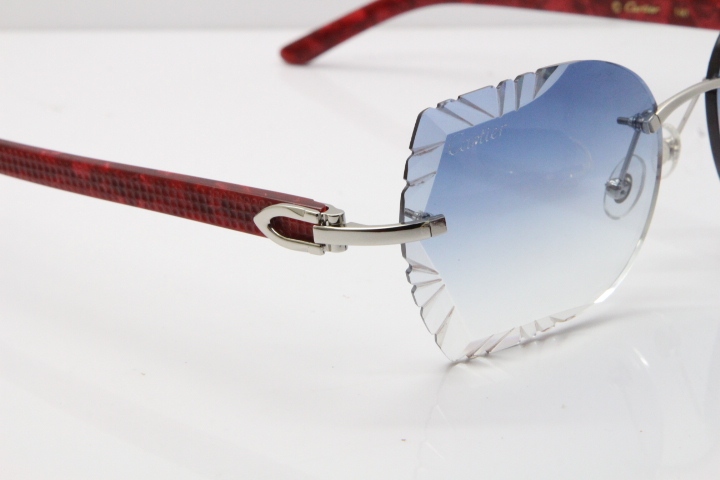 Cartier Rimless T8200762 Marble Red Aztec Arms Sunglasses In Gold Blue Lens