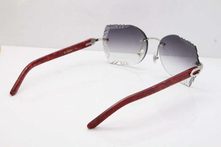 Cartier Rimless T8200762 Marble Red Aztec Arms Sunglasses In Gold Gray Lens