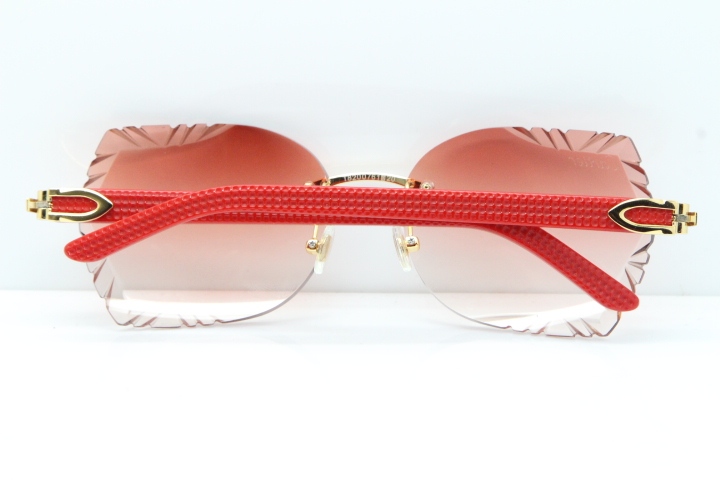 Cartier Rimless T8200762 Red Aztec Arms Sunglasses In Gold Pink Lens