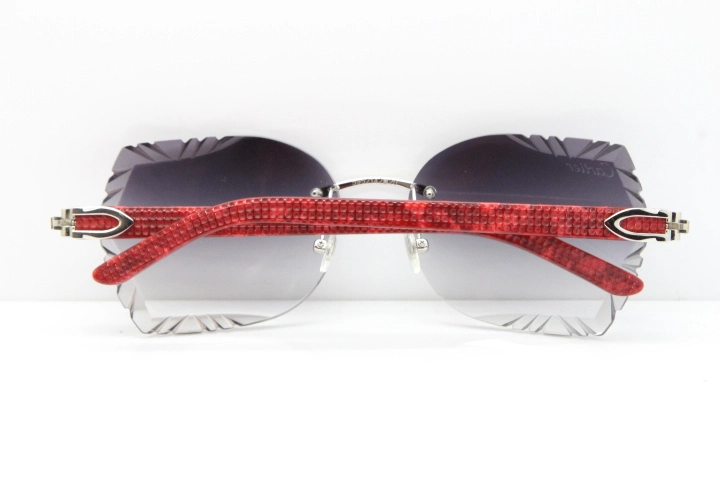 Cartier Rimless T8200762 Marble Red Aztec Arms Sunglasses In Gold Gray Lens