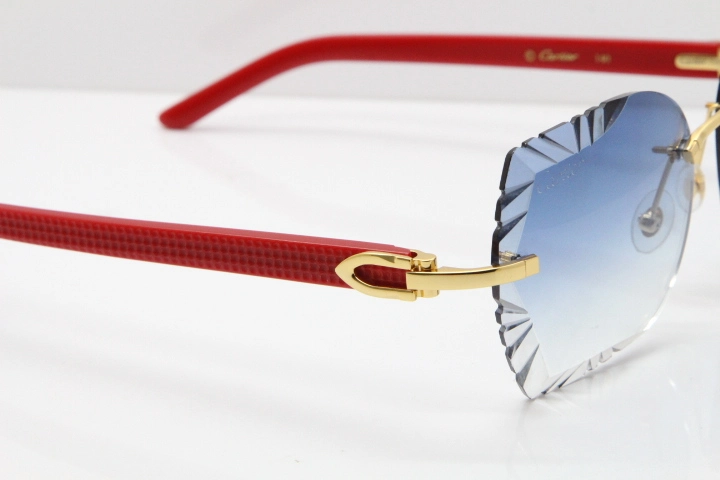 Cartier Rimless T8200762 Red Aztec Arms Sunglasses In Gold Blue Lens