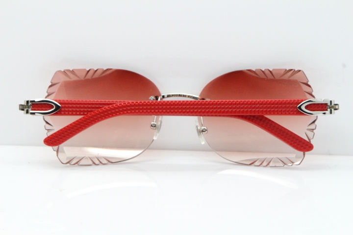 Cartier Rimless T8200762 Red Aztec Arms Sunglasses In Gold Pink Lens