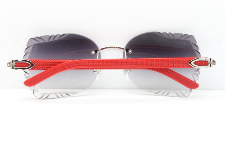 Cartier Rimless T8200762 Red Aztec Arms Sunglasses In Gold Gray Lens