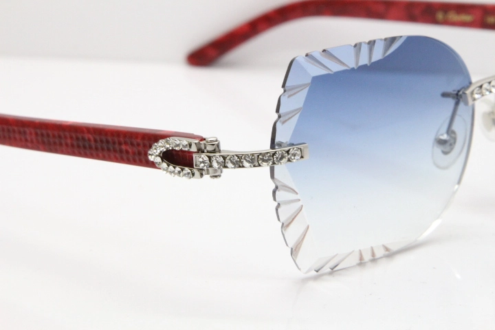 Cartier Rimless T8200762 Big Diamond Marble Red Aztec Arms Sunglasses In Gold Blue Lens