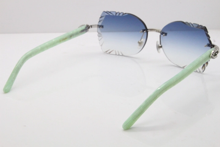 Cartier Rimless T8200762 Big Diamond Marble Green Aztec Arms Sunglasses In Gold Blue Lens