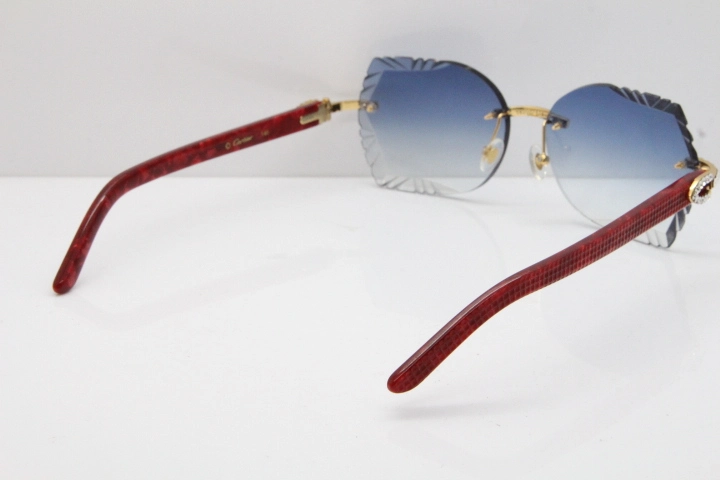 Cartier Rimless T8200762 Big Diamond Marble Red Aztec Arms Sunglasses In Gold Blue Lens