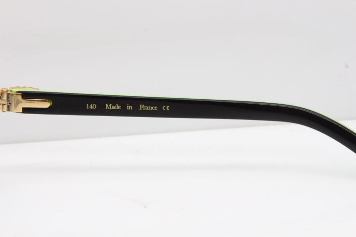 Cartier Rimless T8200762 Big Diamond Black Inside Green Aztec Arms Sunglasses In Gold Blue Lens 