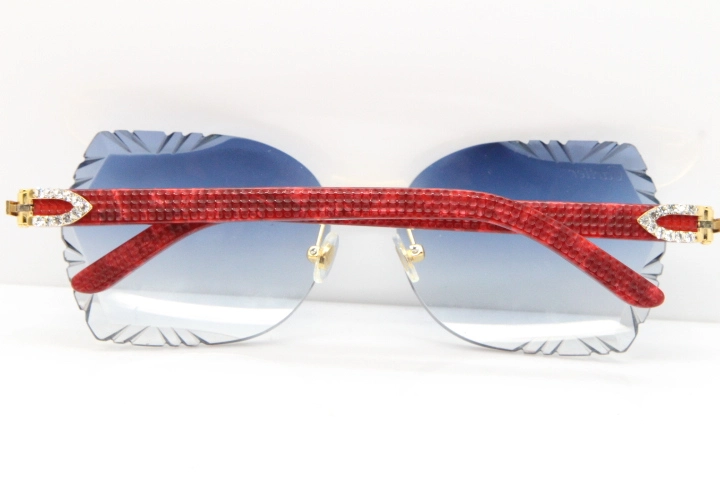 Cartier Rimless T8200762 Big Diamond Marble Red Aztec Arms Sunglasses In Gold Blue Lens