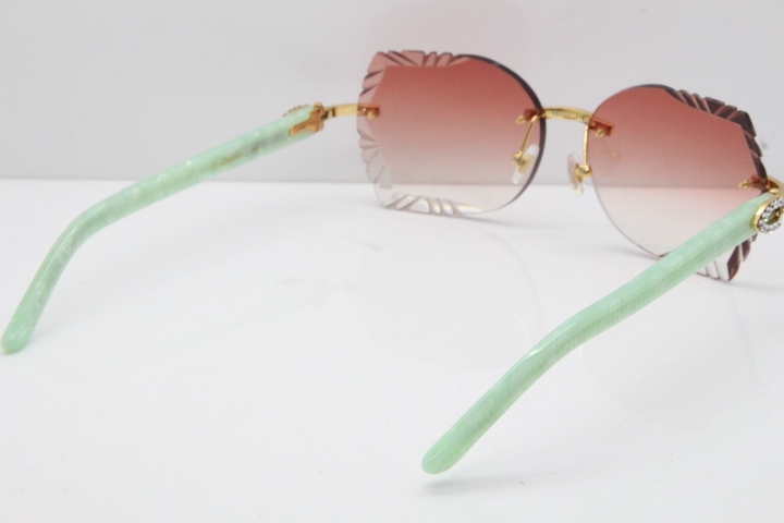 Cartier Rimless T8200762 Big Diamond Marble Green Aztec Arms Sunglasses In Gold Pink Lens