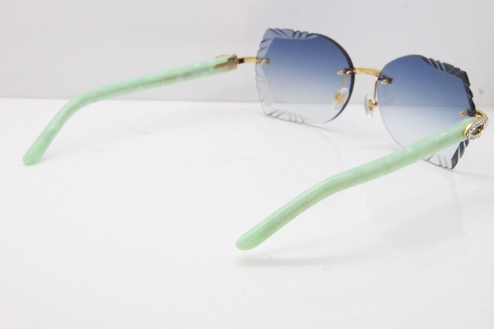 Cartier Rimless T8200762 Big Diamond Marble Green Aztec Arms Sunglasses In Gold Blue Lens