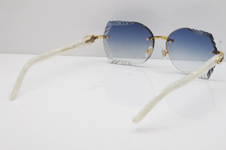 Cartier Rimless T8200762 Big Diamond Marble White Aztec Arms Sunglasses In Gold Blue Lens