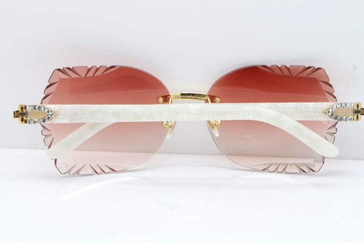 Cartier Rimless T8200762 Big Diamond Marble White Aztec Arms Sunglasses In Gold Red Lens