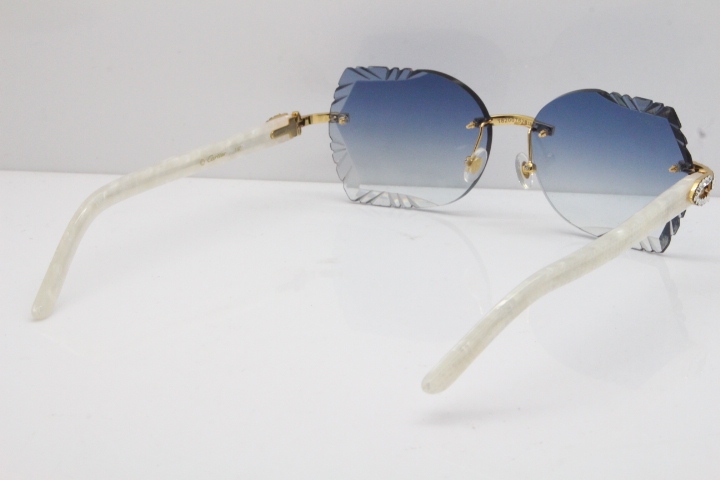 Cartier Rimless T8200762 Big Diamond Marble White Aztec Arms Sunglasses In Gold Blue Lens